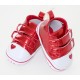 Adorables petites chaussures rouges